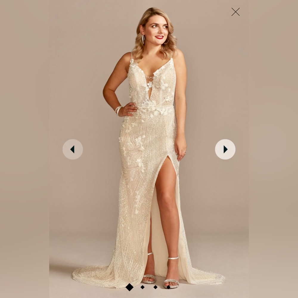 Galina Signature ivory/champagne beaded plunge wedding dress from David’s Bridal